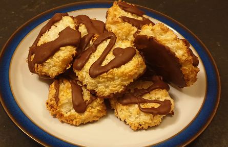 Coconut macaroons dipped and drizzled with chocolate