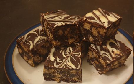 Chocolate tiffin squares with a feathered white chocolate top